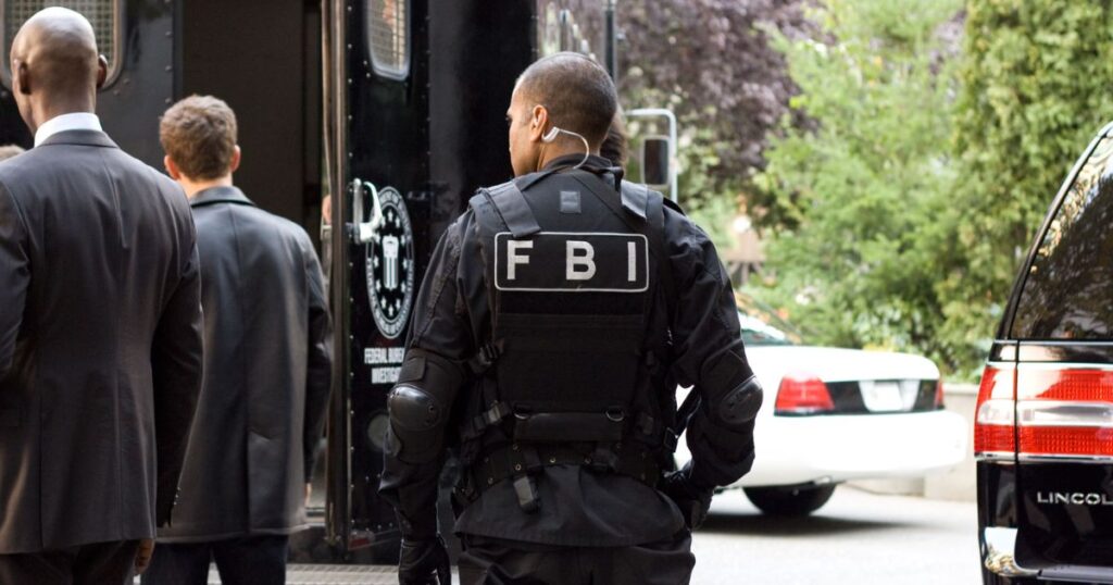 Woman arrested for threatening FBI agent and his family