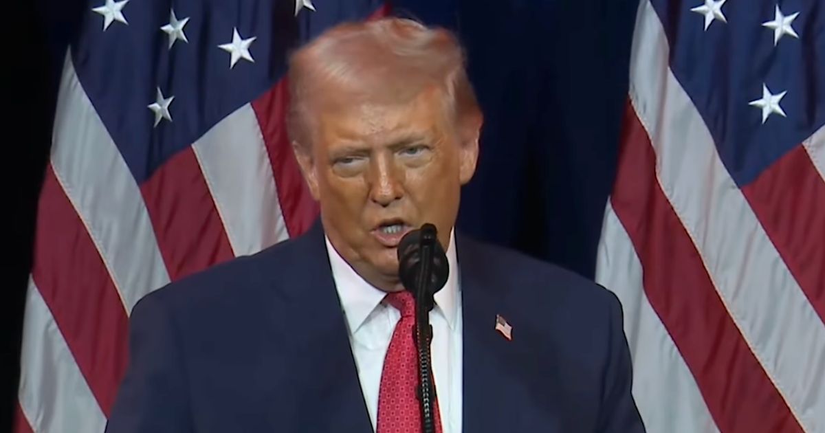 Donald Trump sported pink hair and a shiny orange spray tan job during his recent address at Kennedy Center.