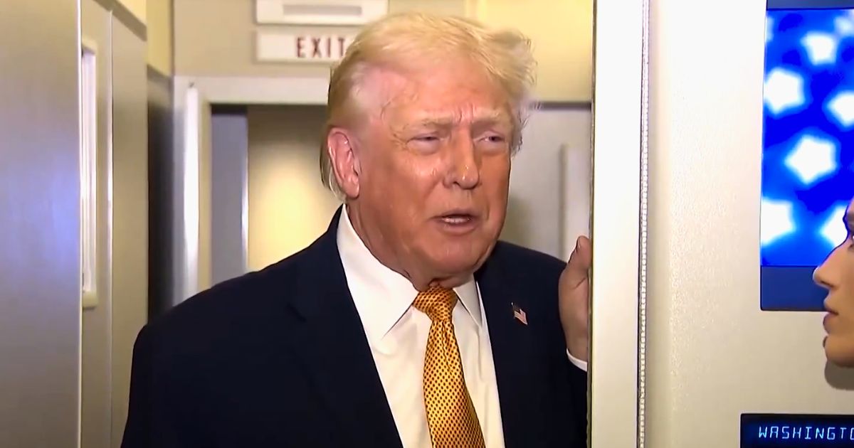 Donald Trump addressing reporters on Air Force One after Venezuela operation