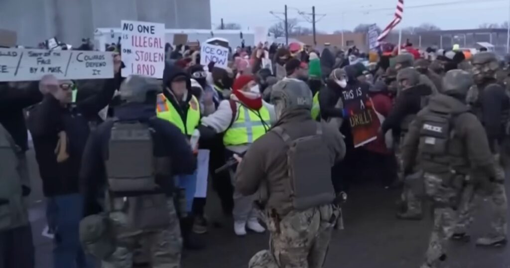 Protesters in Minneapolis form an Anti-ICE barrier after Renee Good's shooting.