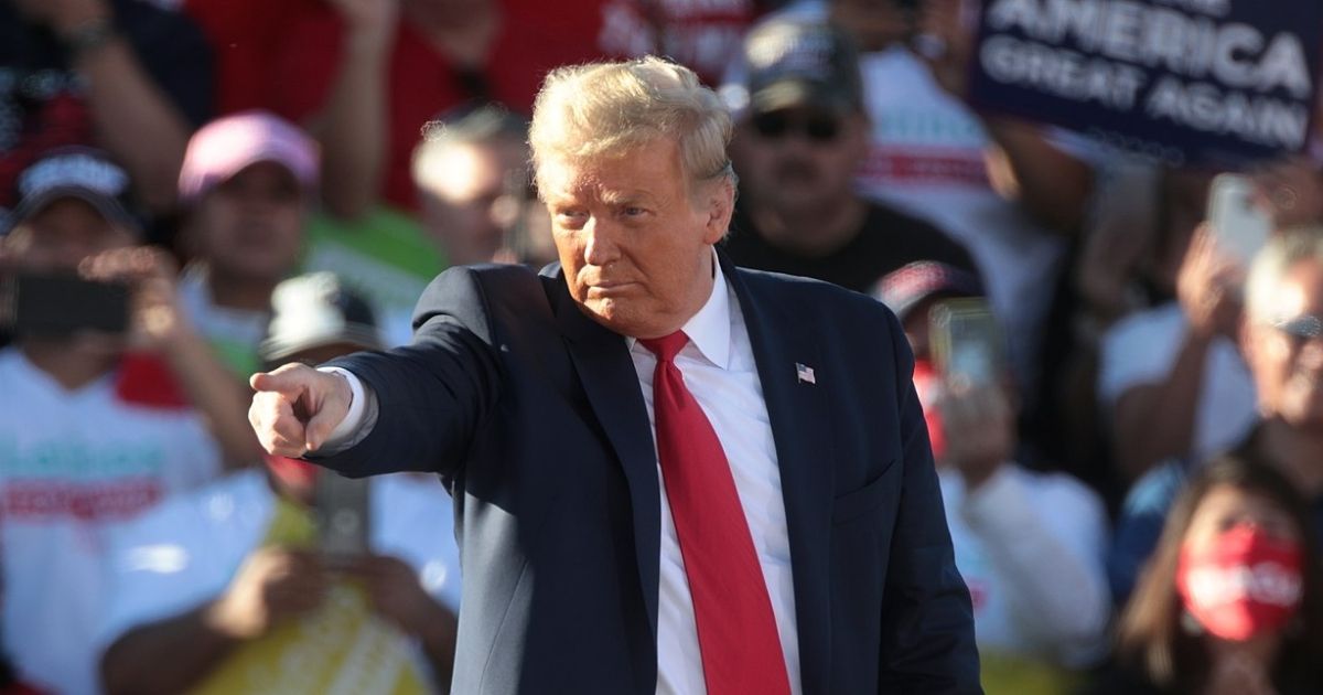 Donald Trump was heckled at Ford factory