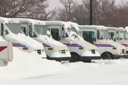 USPS trucks were buried in snow in Ohio after a historic winter storm