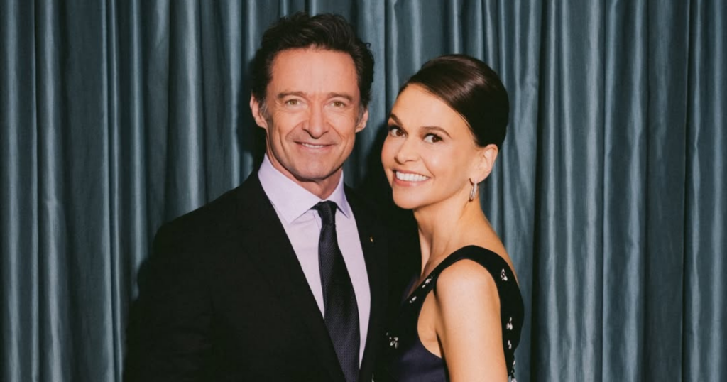 Hugh_Jackman_and_Sutton_Foster_embrace_together