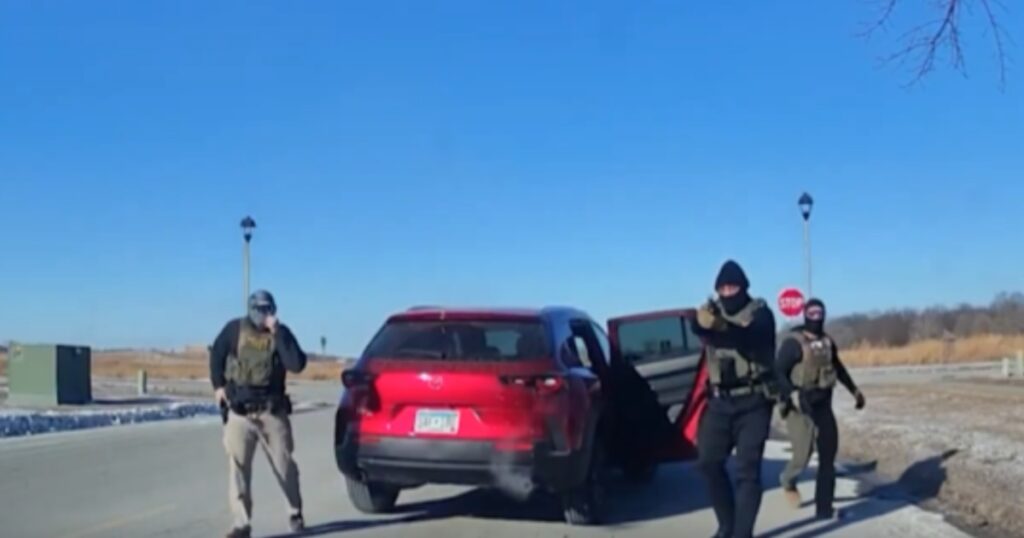 Border patrol Federal agents point gun at unarmed woman in minnesota