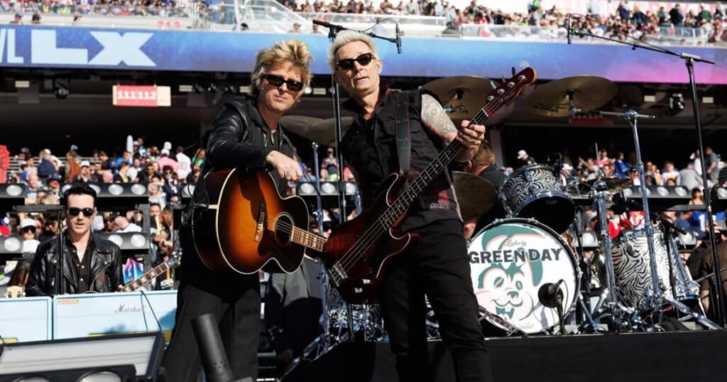 Green Day members performing live at Super Bowl LX opening in California. (@greenday|via Instagram).