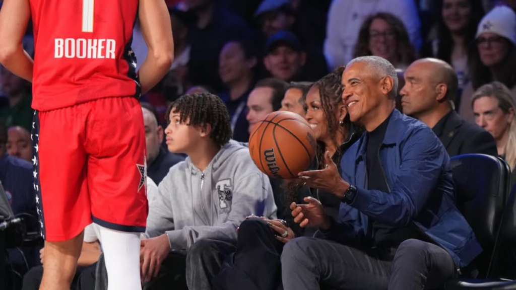 Barack and Michelle Obama pictured at the game