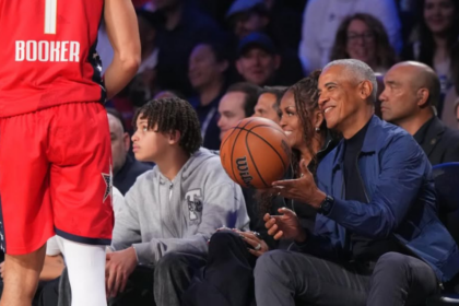 Barack and Michelle Obama pictured at the game