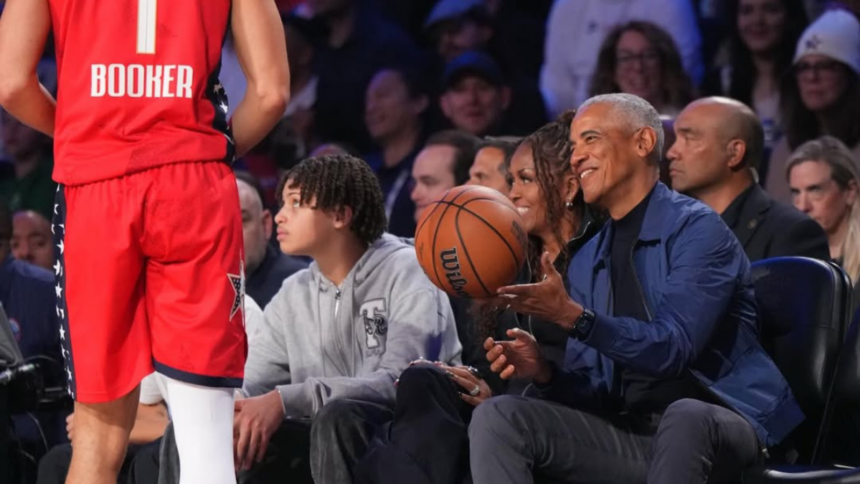 Barack and Michelle Obama pictured at the game