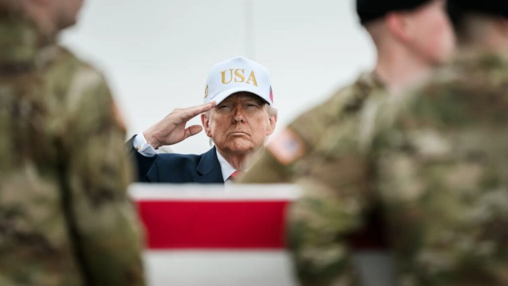 Trump skips attending event for slain soldiers as his baseball cap stirs up critical heat
