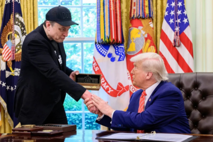 Elon Musk pictured with Donald Trump