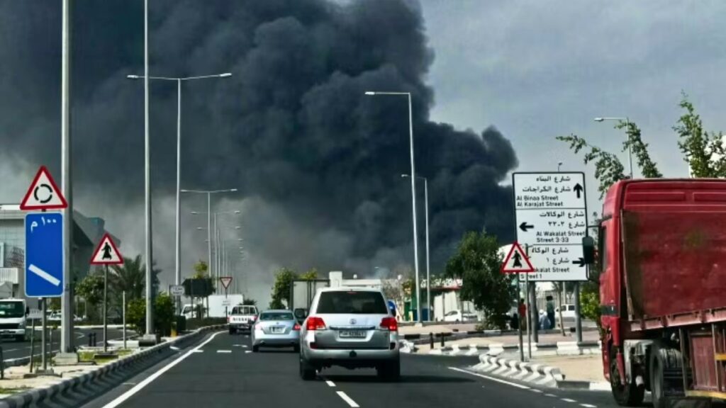 Smoke rises over Tehran as Iran retaliates with strikes across the Gulf region.