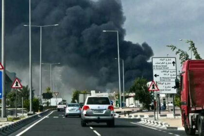 Smoke rises over Tehran as Iran retaliates with strikes across the Gulf region.