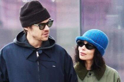 Harry Styles and Zoë Kravitz’s romance heats up with engagement buzz and insider claims about their chemistry. (Instagram/@harpersbazaarus).