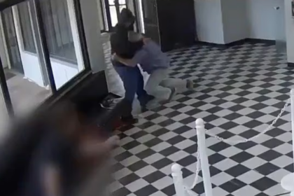 Oklahoma high school principal tackles gunman to save students.