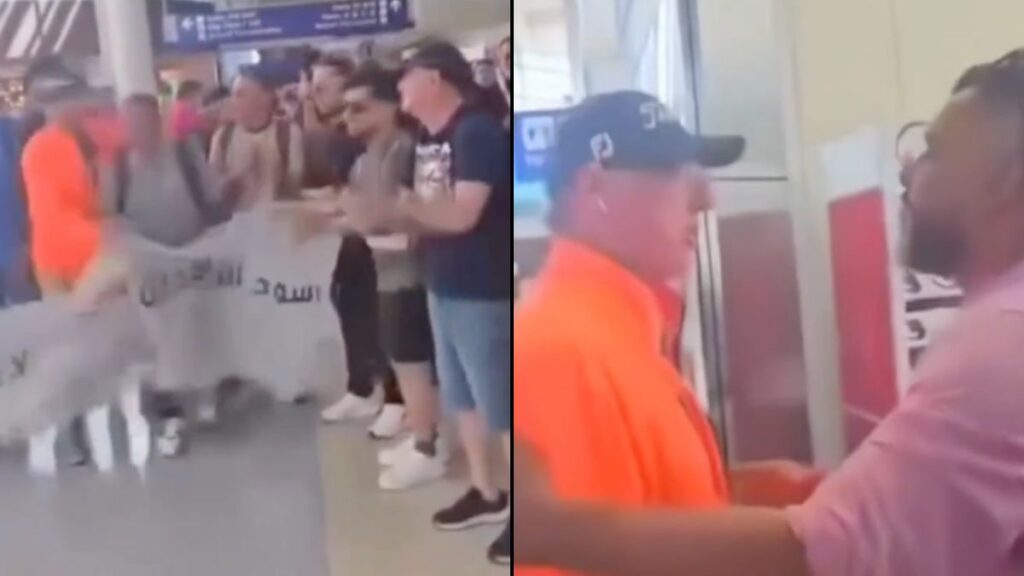 MAGA Man interrupted Iraqi fans mid cheer ahead of FIFA at an airport and threatens to call ICE on them.
