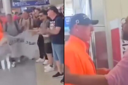 MAGA Man interrupted Iraqi fans mid cheer ahead of FIFA at an airport and threatens to call ICE on them.