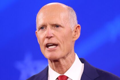 Sen. Rick Scott trolled TMZ by sharing a photo of himself and his family at Disney World