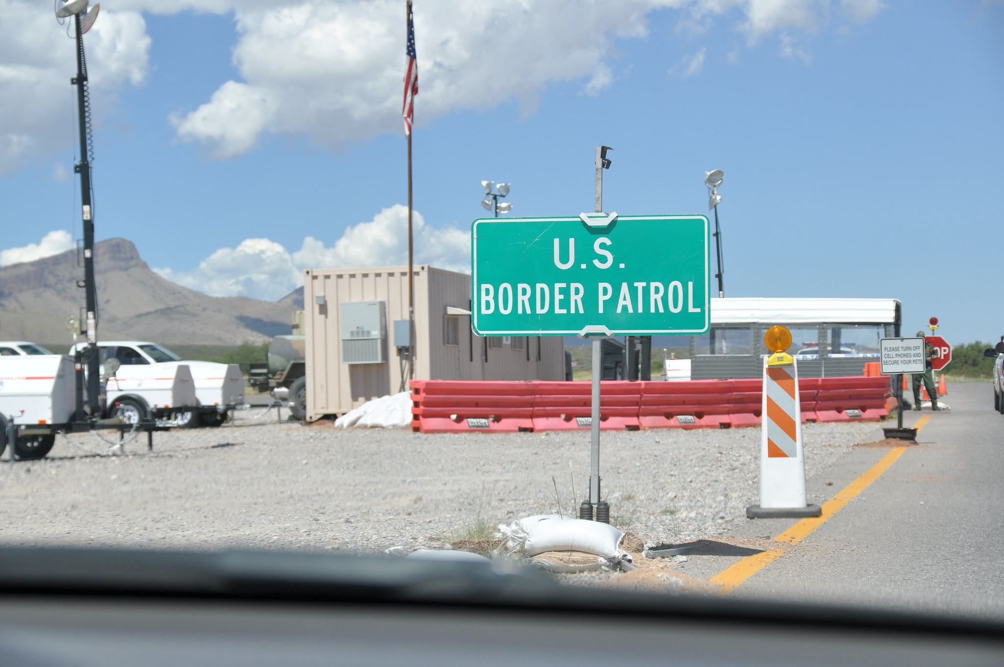 “US Immigration Checkpoint” by Jonathan McIntosh, CC BY 2.0/ Flickr