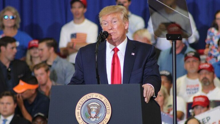 Donald Trump's DOJ issued a blunt response to allegations of deleting of Jan 6, 2021 Capitol riots press releases from its website. (Image Credit: Jackson A. Lanier/ Wikimedia Commons (CC BY-SA 4.0))