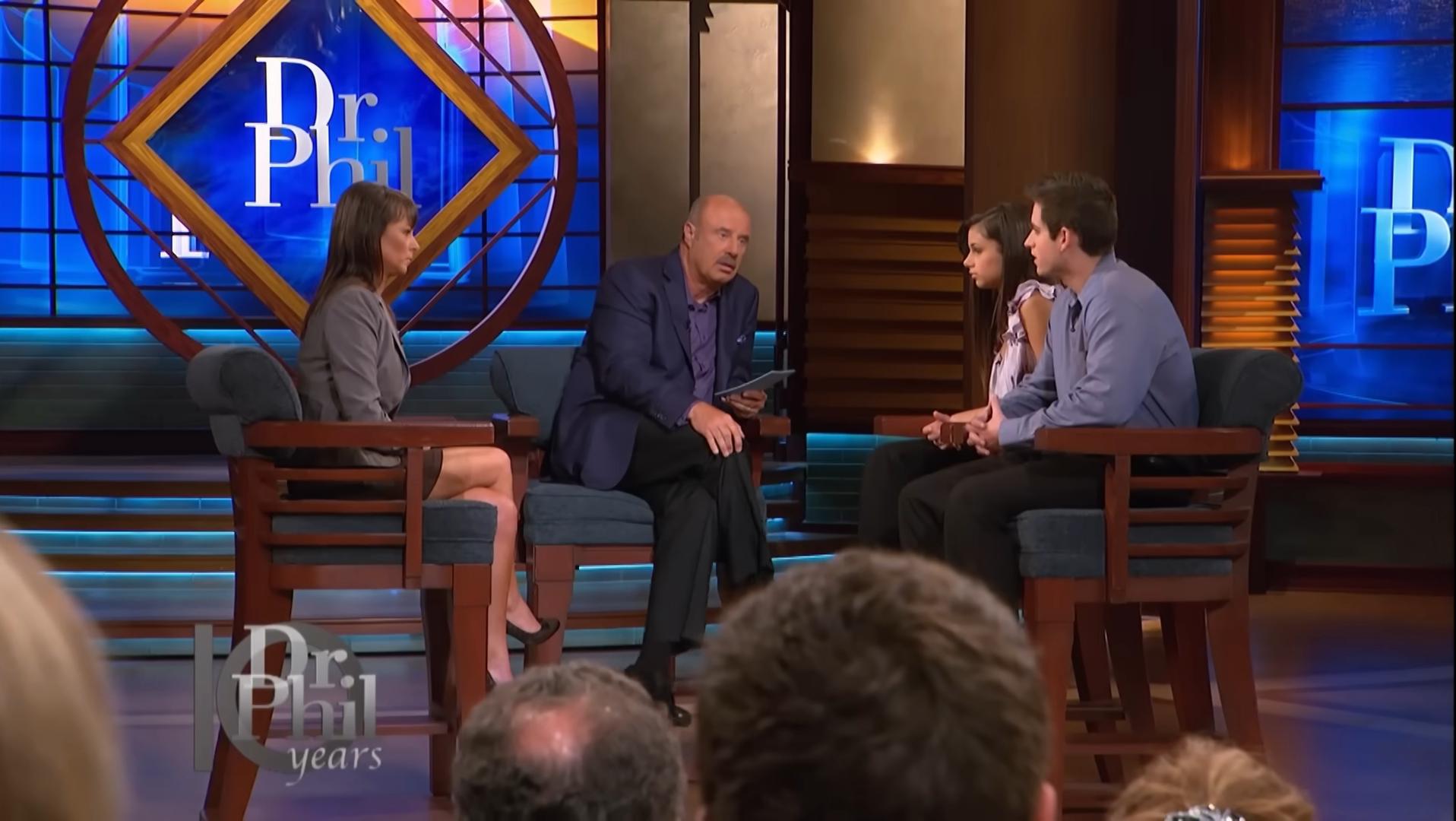Dr. Phil spoke with Dina, Sammie, and her boyfriend Chris. (Image Credits: YouTube/ @drphil)