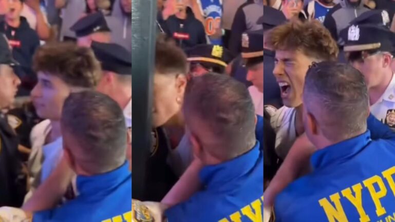NYPD officers detain a Knicks fan outside Madison Square Garden during NBA Finals Game 2 celebrations. (Image Credits-@mrcheckpoint/Instagram)